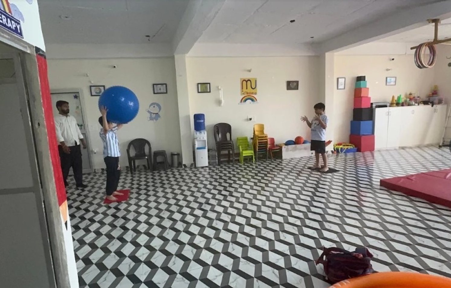 Sensory gym session with therapy ball